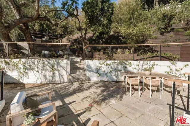 an aerial view of residential house and green space