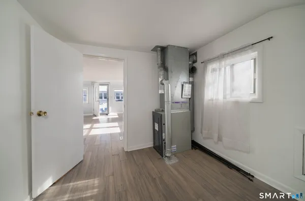 a kitchen with stainless steel appliances a sink and a refrigerator