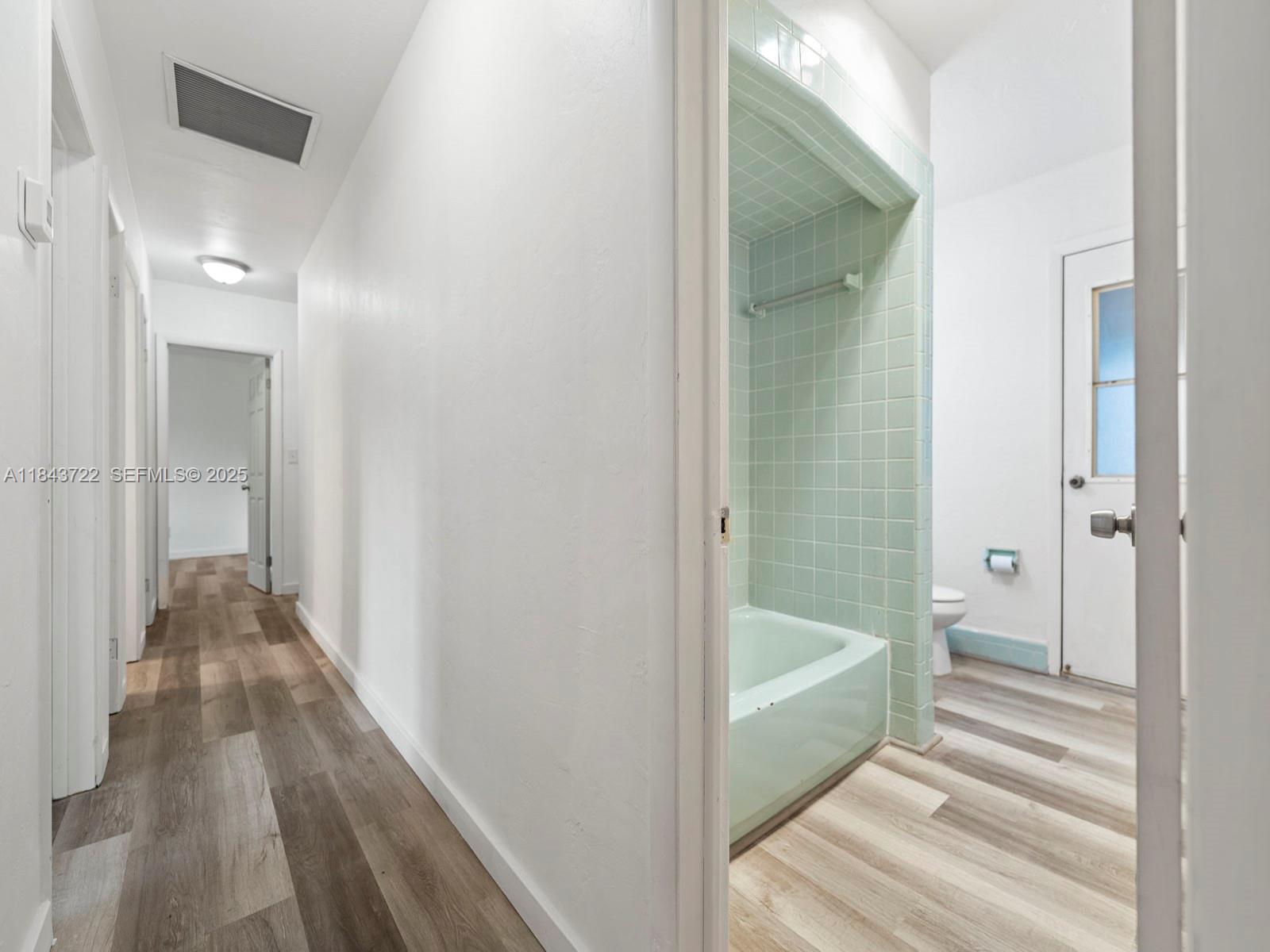 17300 Southwest 300th Street Homestead, FL 33030 - Photo 17 of 33 a bathroom with a bathtub and shower