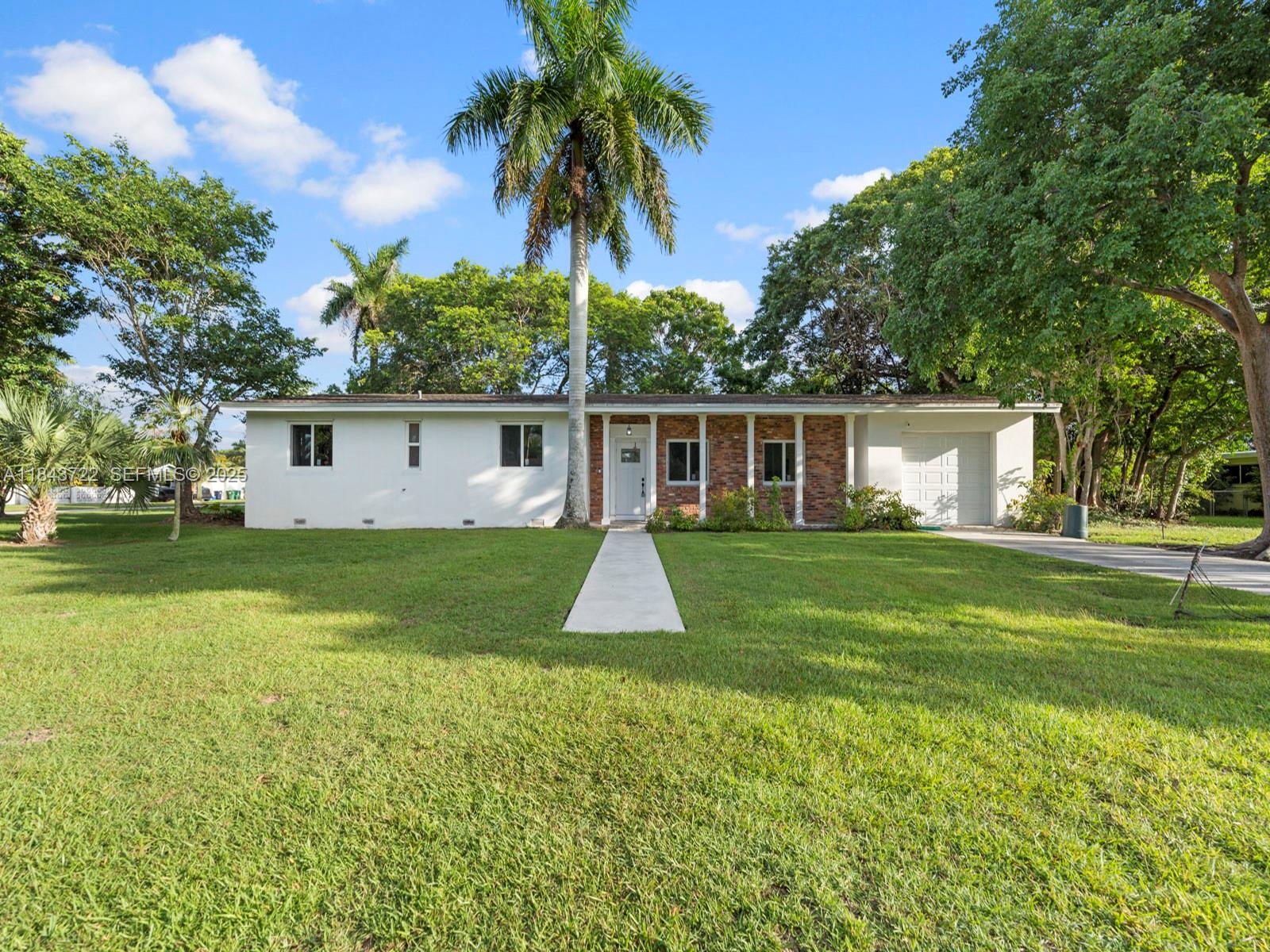 17300 Southwest 300th Street Homestead, FL 33030 - Photo 33 of 33 a view of a yard with a house
