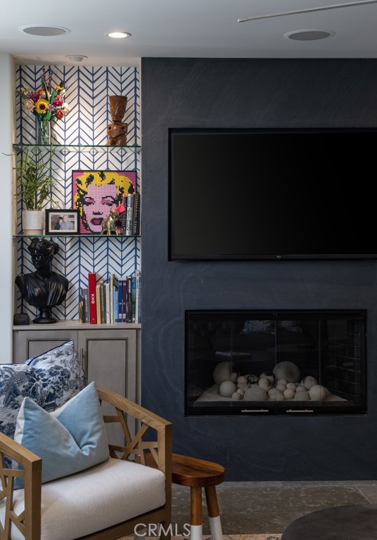 309 Marguerite Avenue, Unit C Corona del Mar, CA 92625 - Photo 4 of 15 a living room with furniture and a fireplace