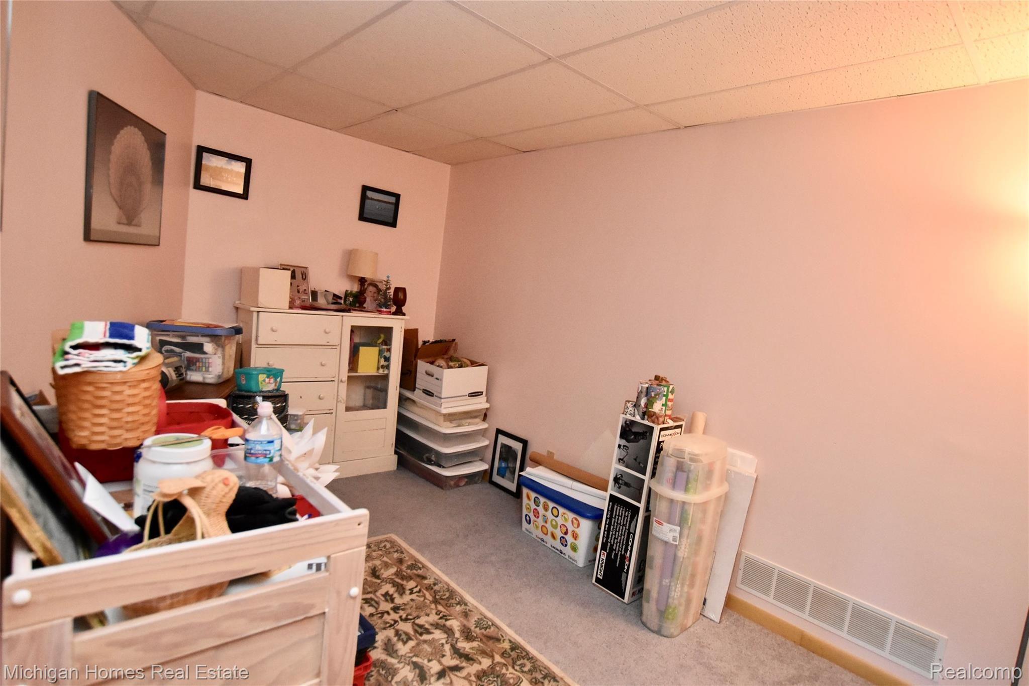 9753 Gibbs Road Clarkston, MI 48348 - Photo 28 of 43 Basement craft room