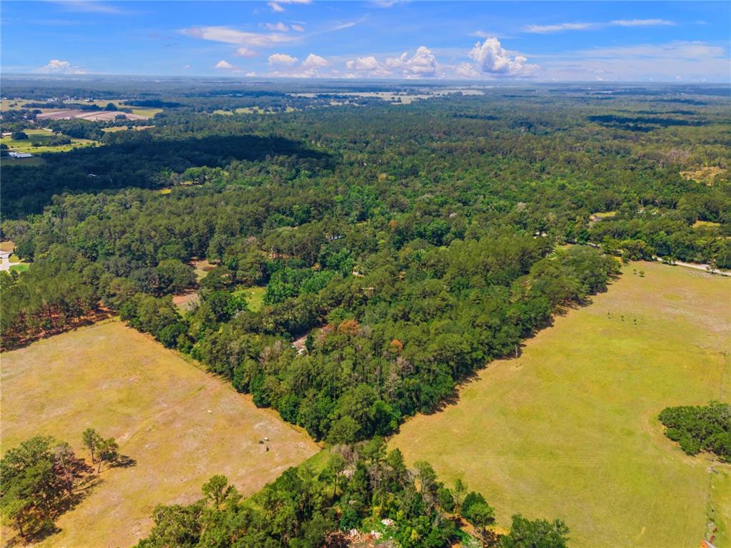 1074 Culbreath Road Brooksville, FL 34602 - Photo 20 of 20 a view of a city with an ocean