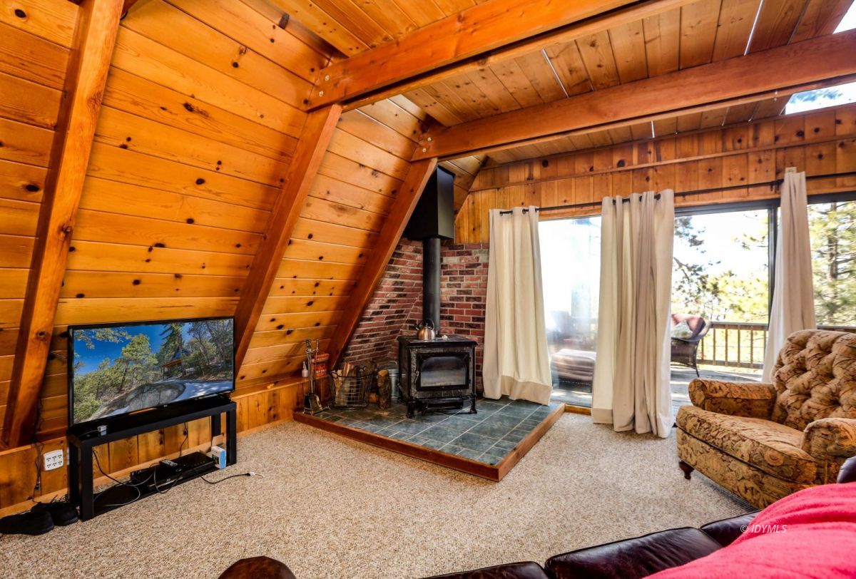 24636 Logan Creek Road Idyllwild, CA 92549 - Photo 7 of 29 Living room with wood burning stove
