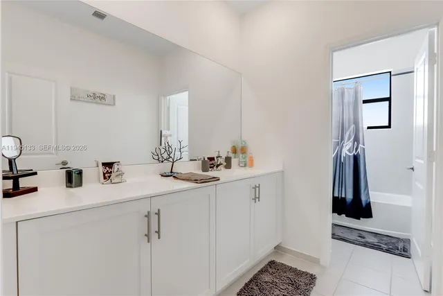 a view of storage and utility room with racks on the wall