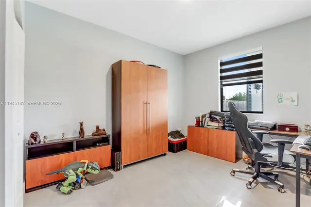 a bathroom with a sink toilet and mirror