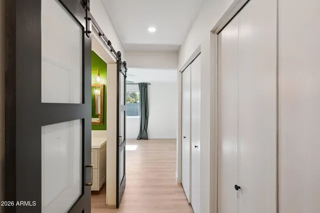 a view of hallway with livingroom and hallway