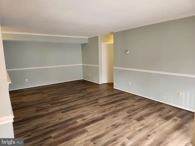 a bathroom with a shower and a toilet