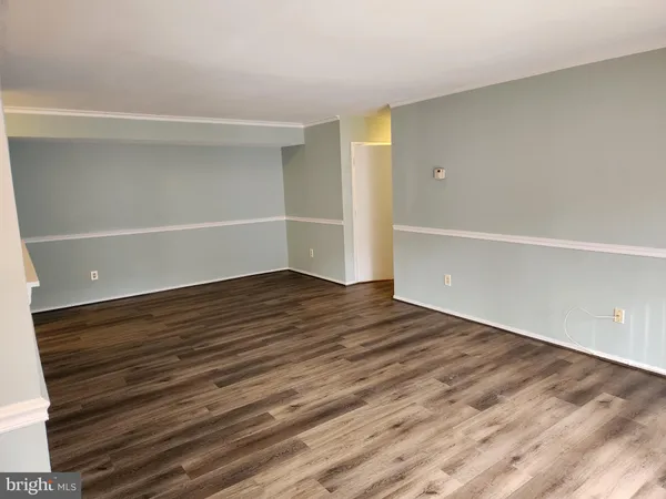 a bathroom with a shower and a toilet