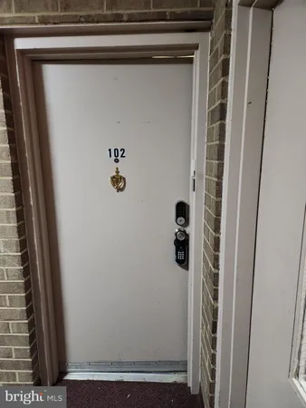 a kitchen with stainless steel appliances granite countertop a refrigerator and a stove