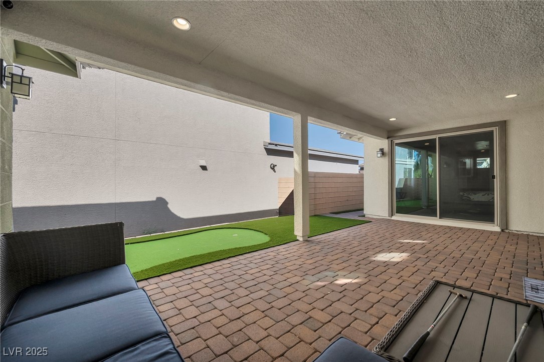 1012 East Sunset Road Henderson, NV 89011 - Photo 12 of 77 View of patio featuring an area to practice putting
