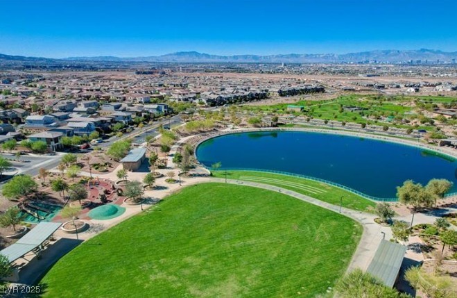 1012 East Sunset Road Henderson, NV 89011 - Photo 18 of 77 Aerial perspective of suburban area featuring a water and mountain view