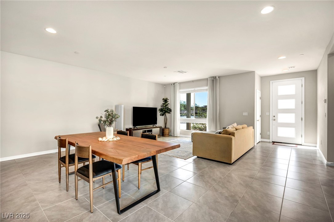 1012 East Sunset Road Henderson, NV 89011 - Photo 44 of 77 Dining room featuring recessed lighting and light tile patterned flooring
