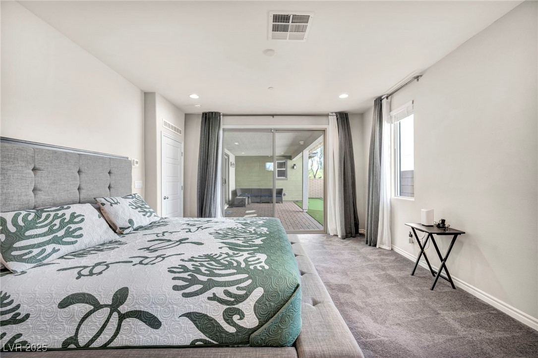 1012 East Sunset Road Henderson, NV 89011 - Photo 57 of 77 Carpeted bedroom with access to outside and recessed lighting