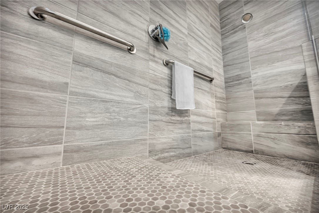 1012 East Sunset Road Henderson, NV 89011 - Photo 62 of 77 Full bath featuring tiled shower