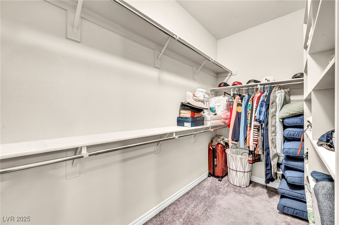 1012 East Sunset Road Henderson, NV 89011 - Photo 63 of 77 Spacious closet with light colored carpet