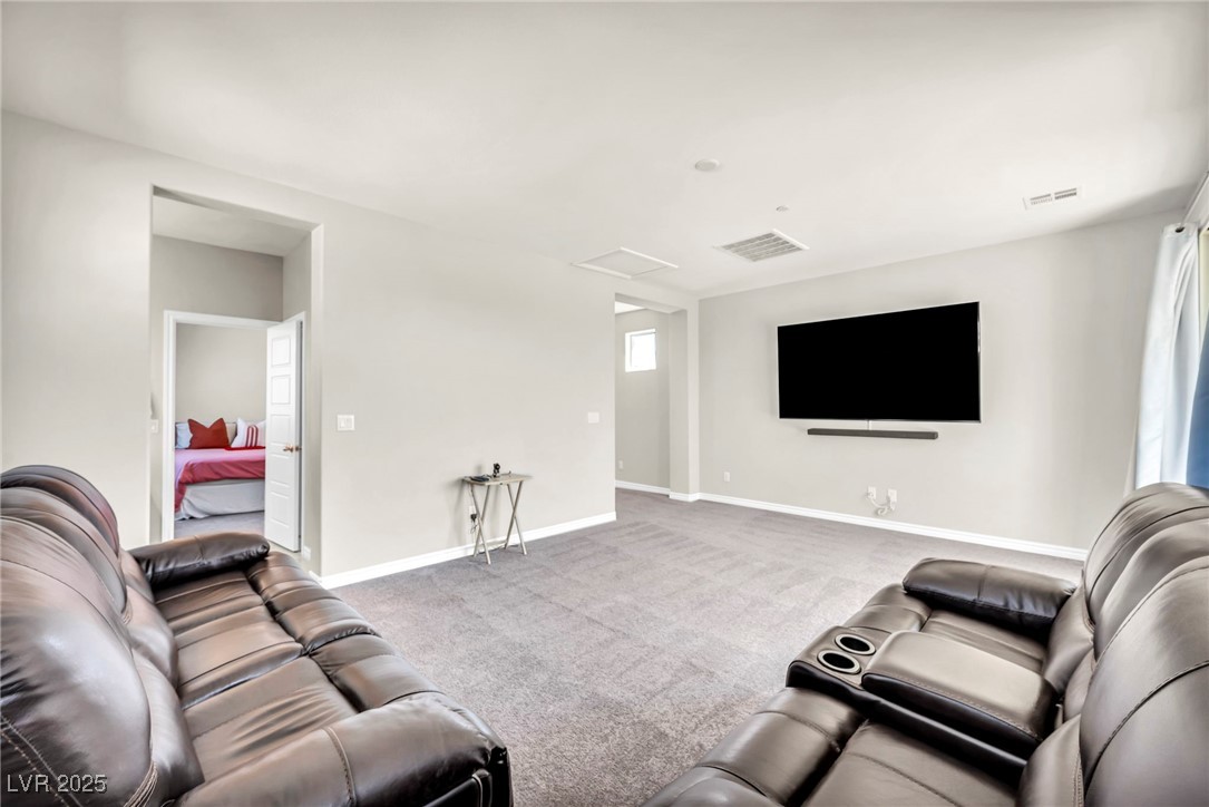 1012 East Sunset Road Henderson, NV 89011 - Photo 70 of 77 Loft with attic access and carpet flooring