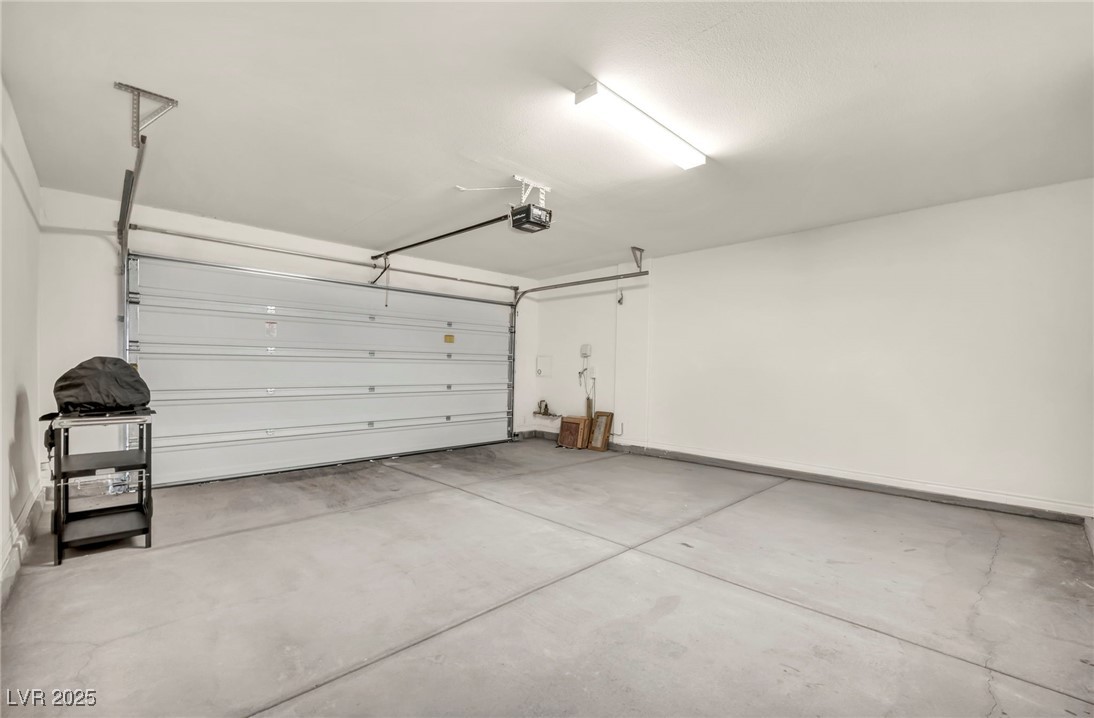 1012 East Sunset Road Henderson, NV 89011 - Photo 74 of 77 Garage featuring a garage door opener