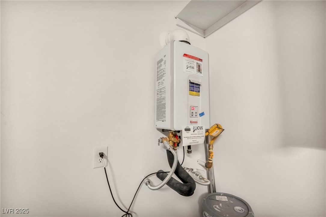 1012 East Sunset Road Henderson, NV 89011 - Photo 75 of 77 Utility room with water heater
