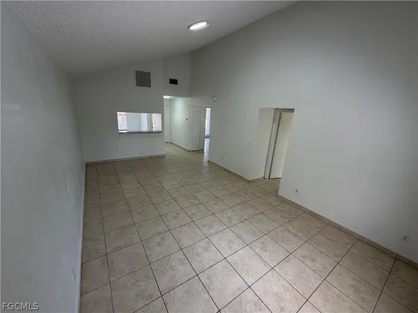 an empty room with a bathroom