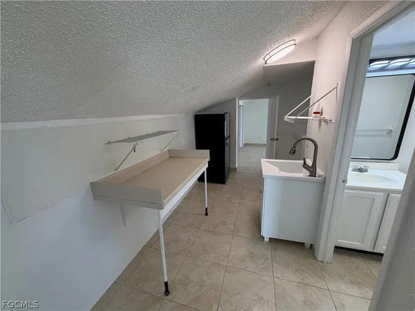 a view of storage and utility room