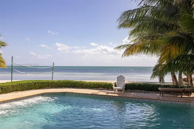 a view of a chairs and tables in the patio