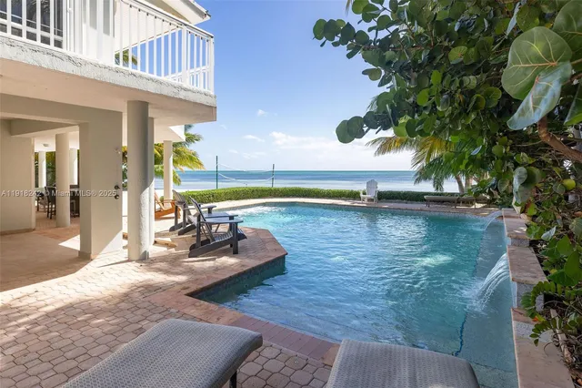 a view of a street with a building in the background