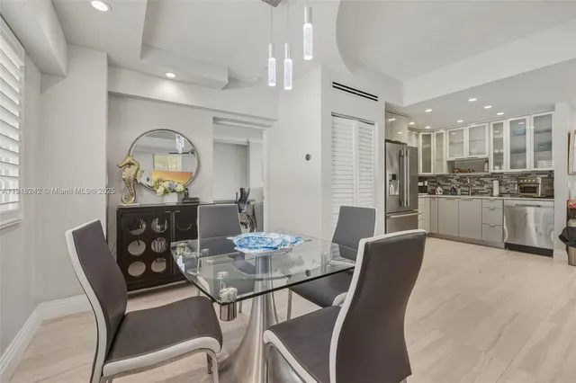 a view of a dining room with furniture window and outside view
