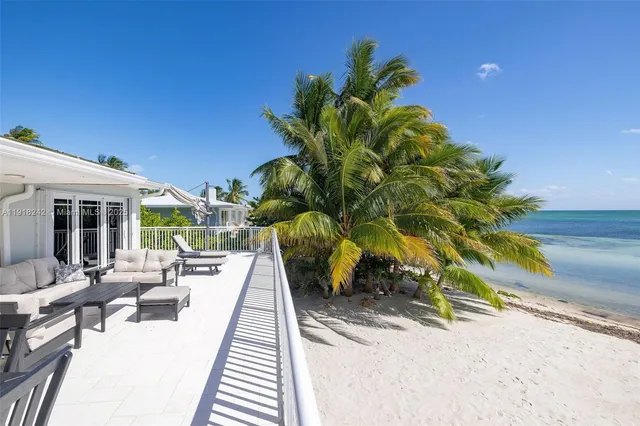 a bedroom with a bed and a desk