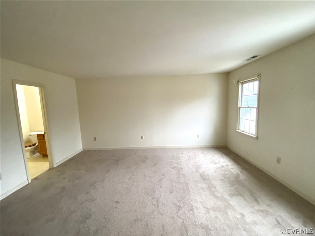 5137 Hackney Road Richmond, VA 23234 - Photo 17 of 43 an empty room with windows