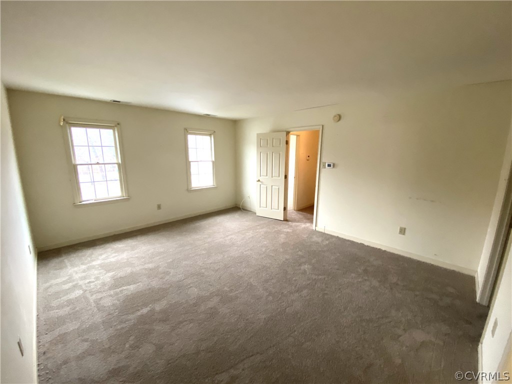 5137 Hackney Road Richmond, VA 23234 - Photo 20 of 43 an empty room with windows