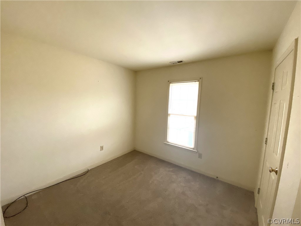 5137 Hackney Road Richmond, VA 23234 - Photo 24 of 43 an empty room with a window
