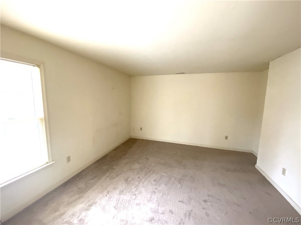 5137 Hackney Road Richmond, VA 23234 - Photo 28 of 43 an empty room with a window