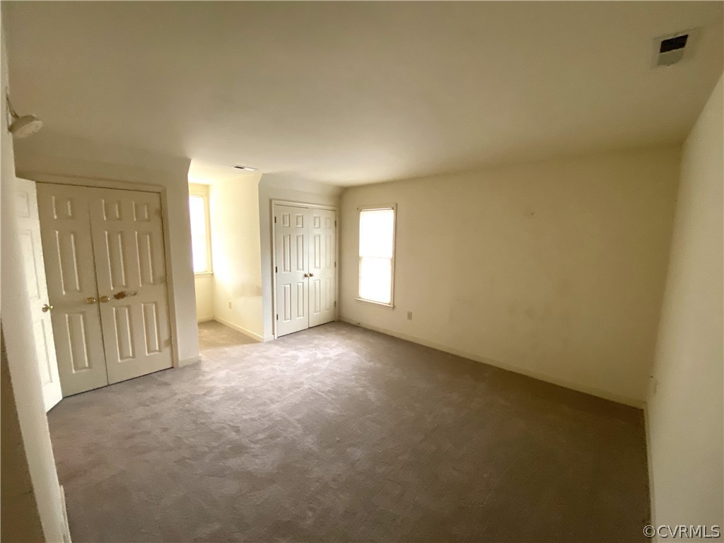 5137 Hackney Road Richmond, VA 23234 - Photo 31 of 43 an empty room with windows