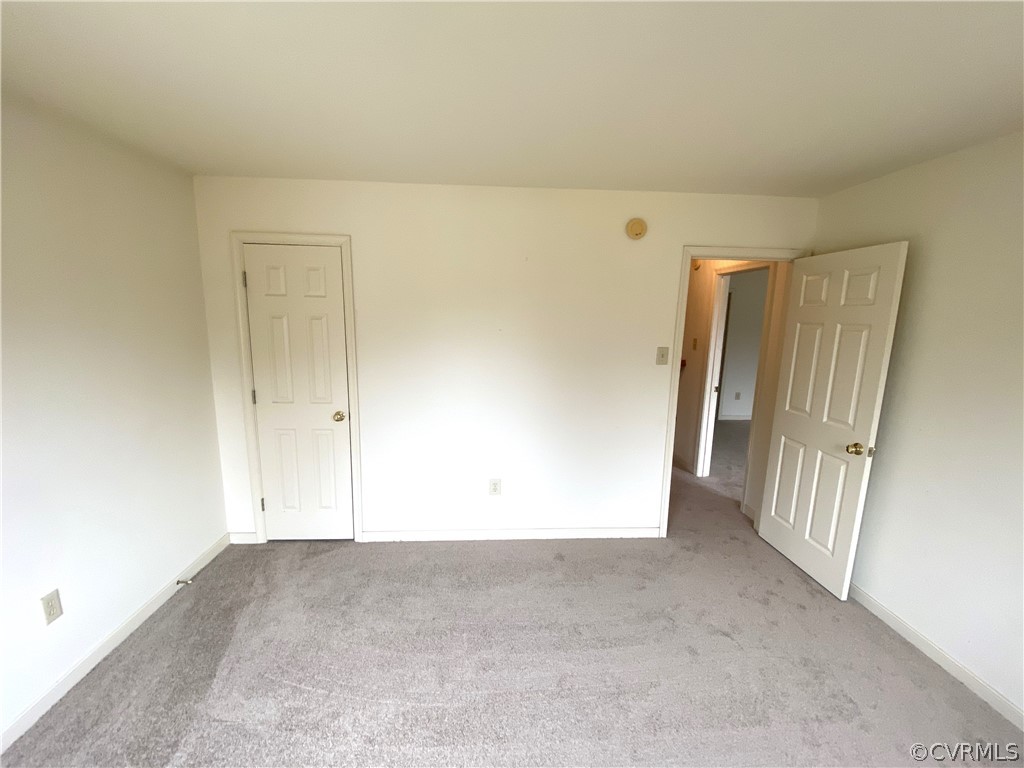 5137 Hackney Road Richmond, VA 23234 - Photo 34 of 43 an empty room with a door