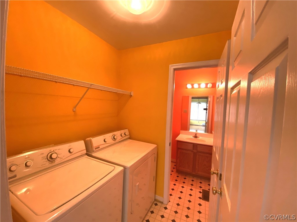 5137 Hackney Road Richmond, VA 23234 - Photo 36 of 43 a utility room with dryer and washer