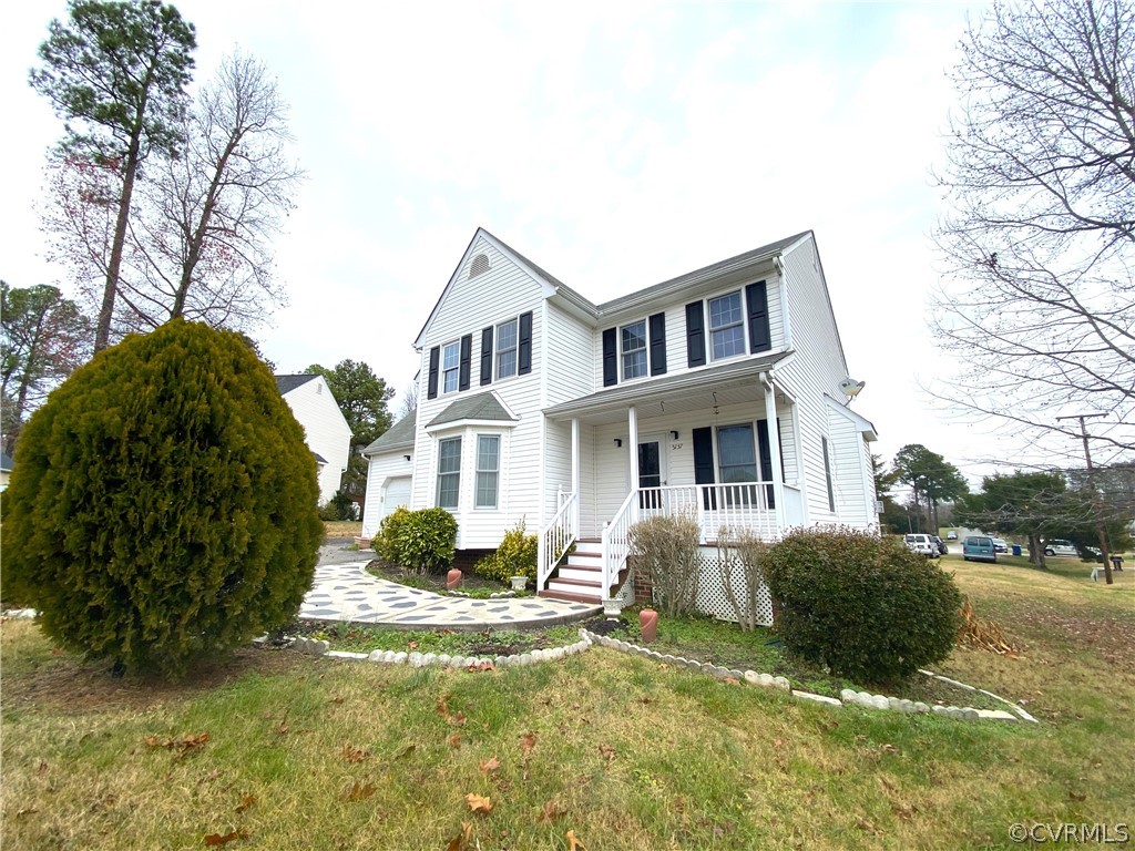 5137 Hackney Road Richmond, VA 23234 - Photo 39 of 43 a front view of a house with a yard