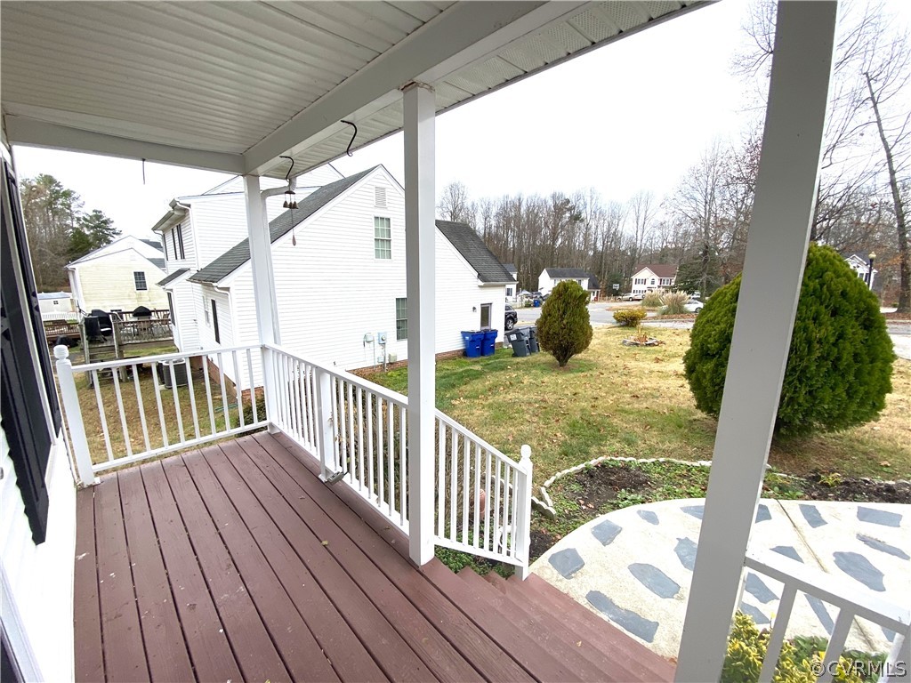5137 Hackney Road Richmond, VA 23234 - Photo 42 of 43 a view of a balcony with wooden floor