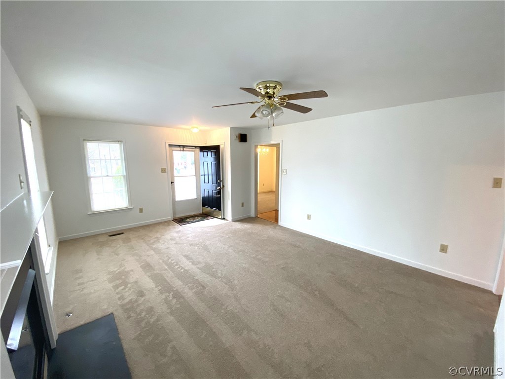 5137 Hackney Road Richmond, VA 23234 - Photo 5 of 43 an empty room with a empty space and windows