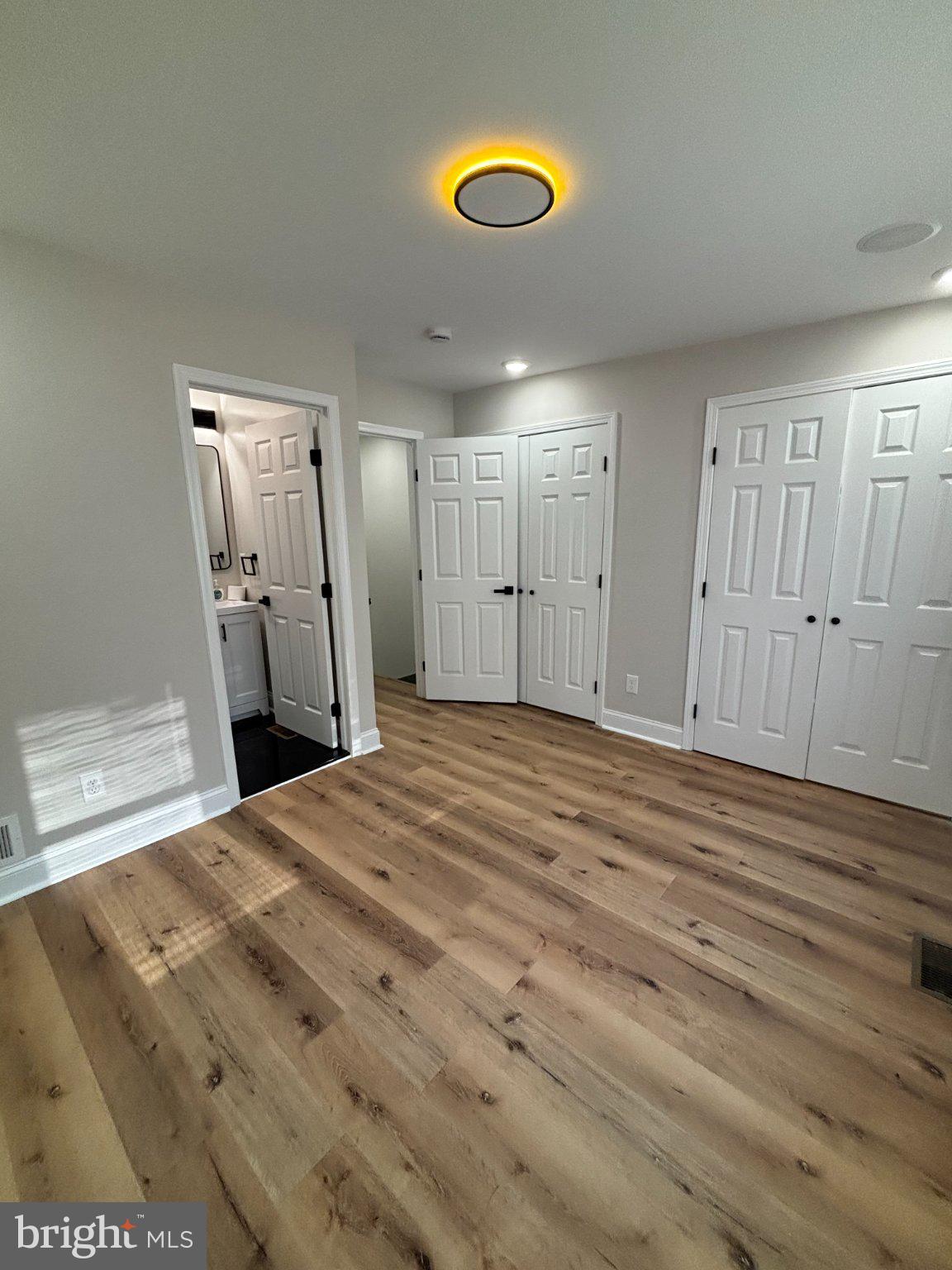 4818 Pimlico Road Baltimore, MD 21215 - Photo 8 of 18 Spacious room with modern finishes.