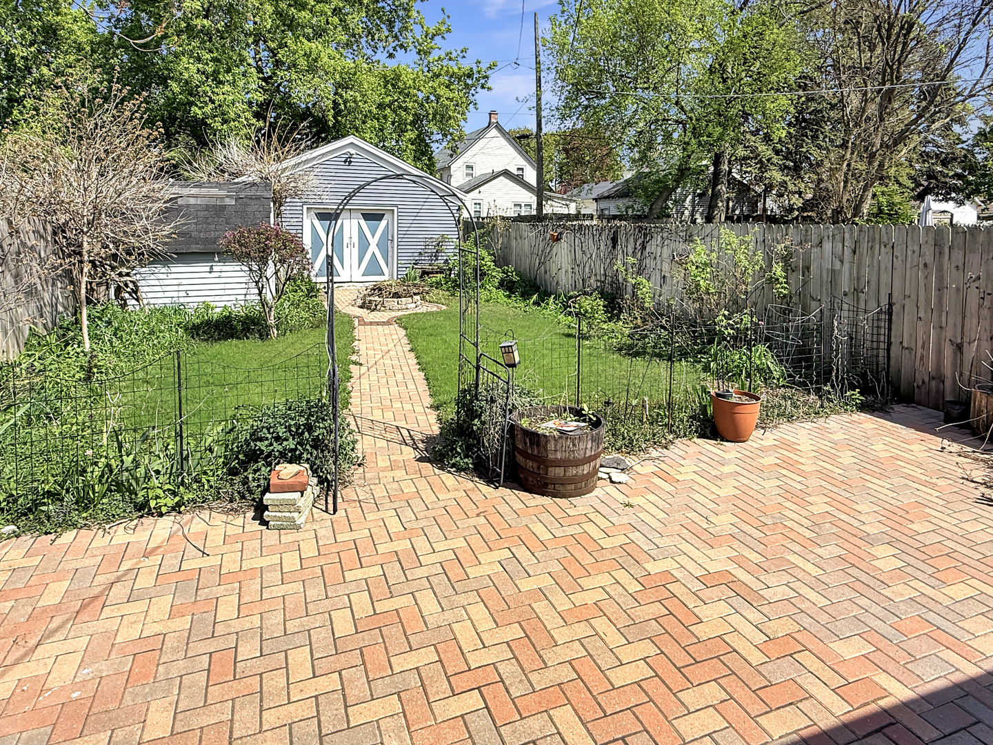 511 Chestnut Street Waukegan, IL 60085 - Photo 14 of 17 a view of garden with wooden stairs