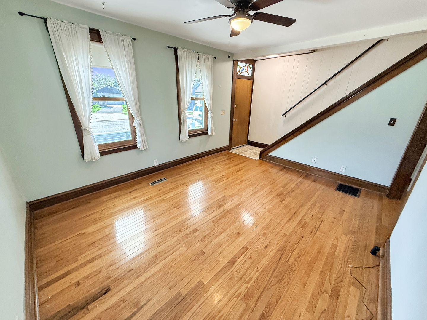 511 Chestnut Street Waukegan, IL 60085 - Photo 4 of 17 a view of an empty room with a window