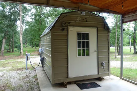 a view of a porch with a yard