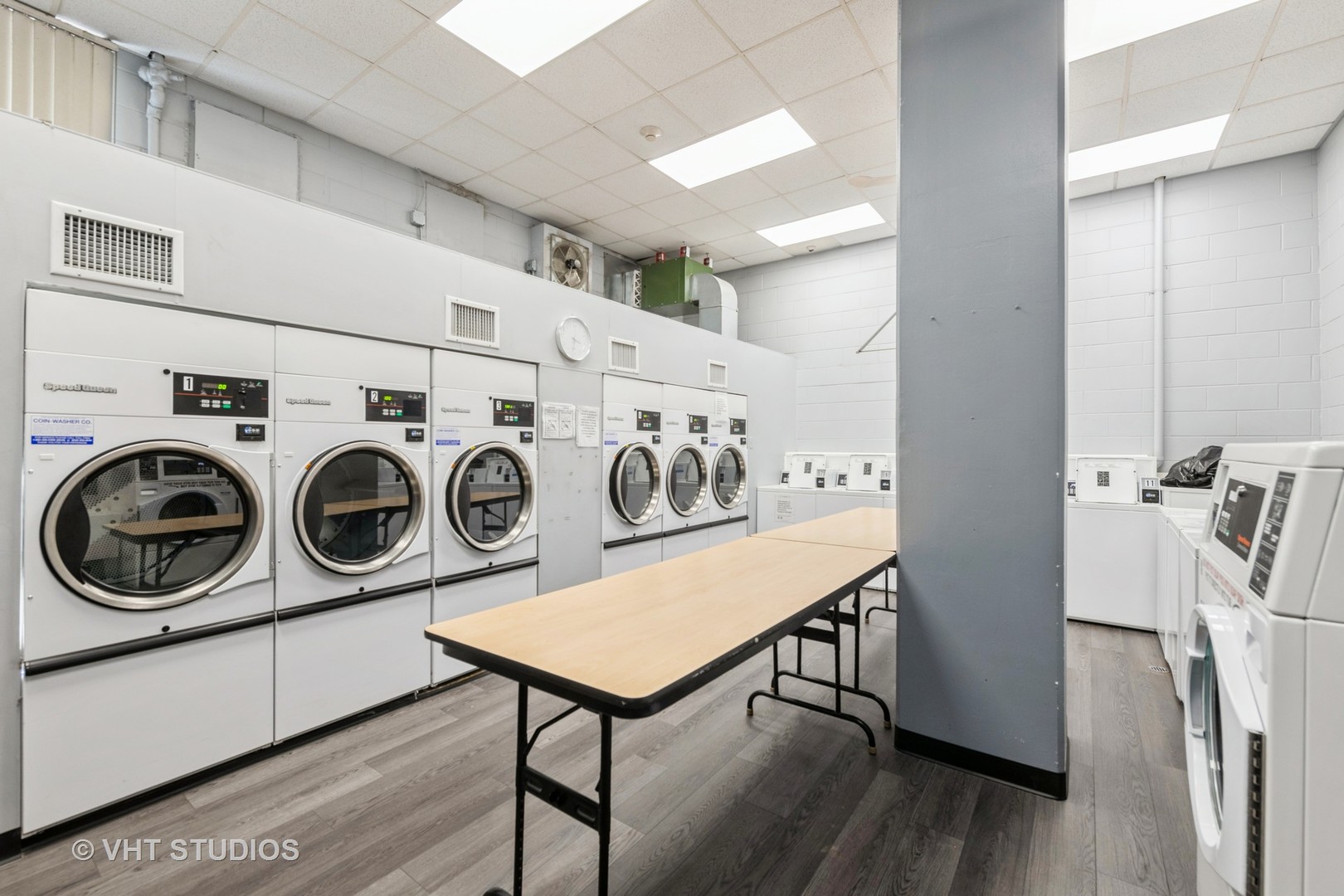 40 North Tower Road, Unit 14A Oak Brook, IL 60523 - Photo 18 of 18 a utility room with dryer and washer