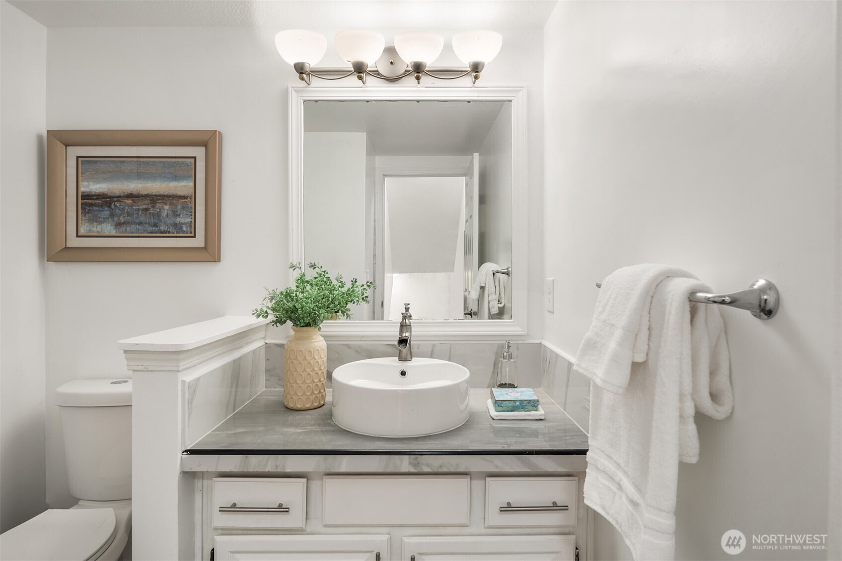 2805 Cedar Avenue South Renton, WA 98055 - Photo 22 of 40 a bathroom with a granite countertop sink a toilet and mirror
