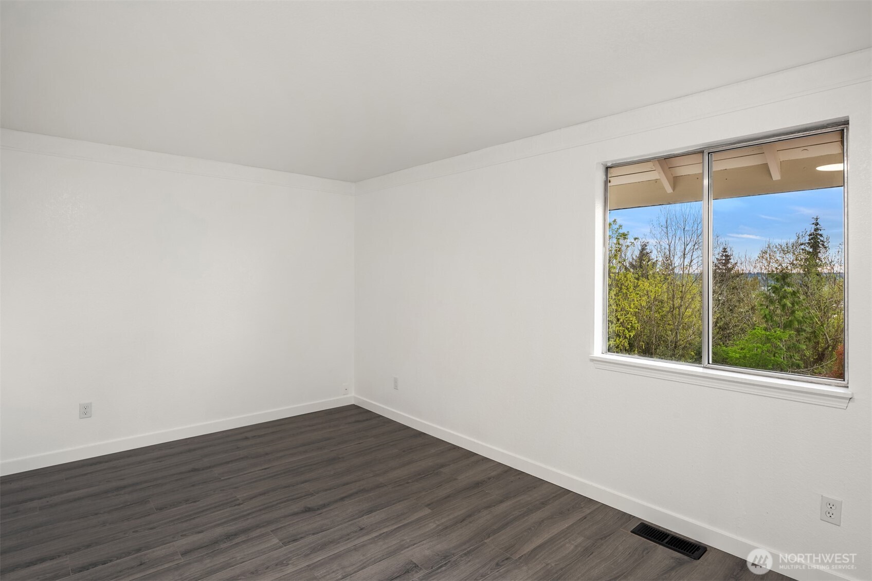 2805 Cedar Avenue South Renton, WA 98055 - Photo 28 of 40 a view of a small space with wooden floor and a window