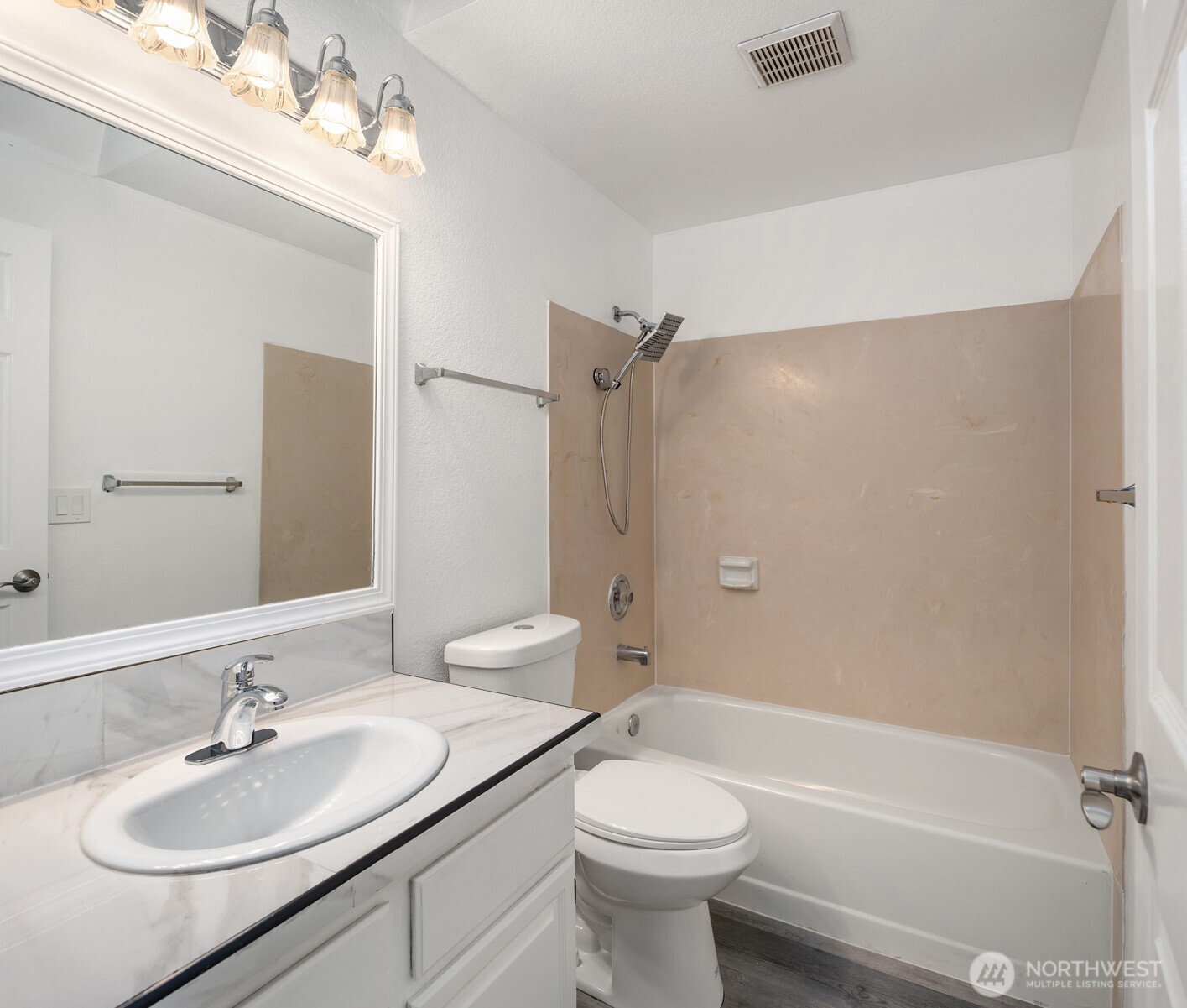 2805 Cedar Avenue South Renton, WA 98055 - Photo 30 of 40 a bathroom with a sink a toilet and shower