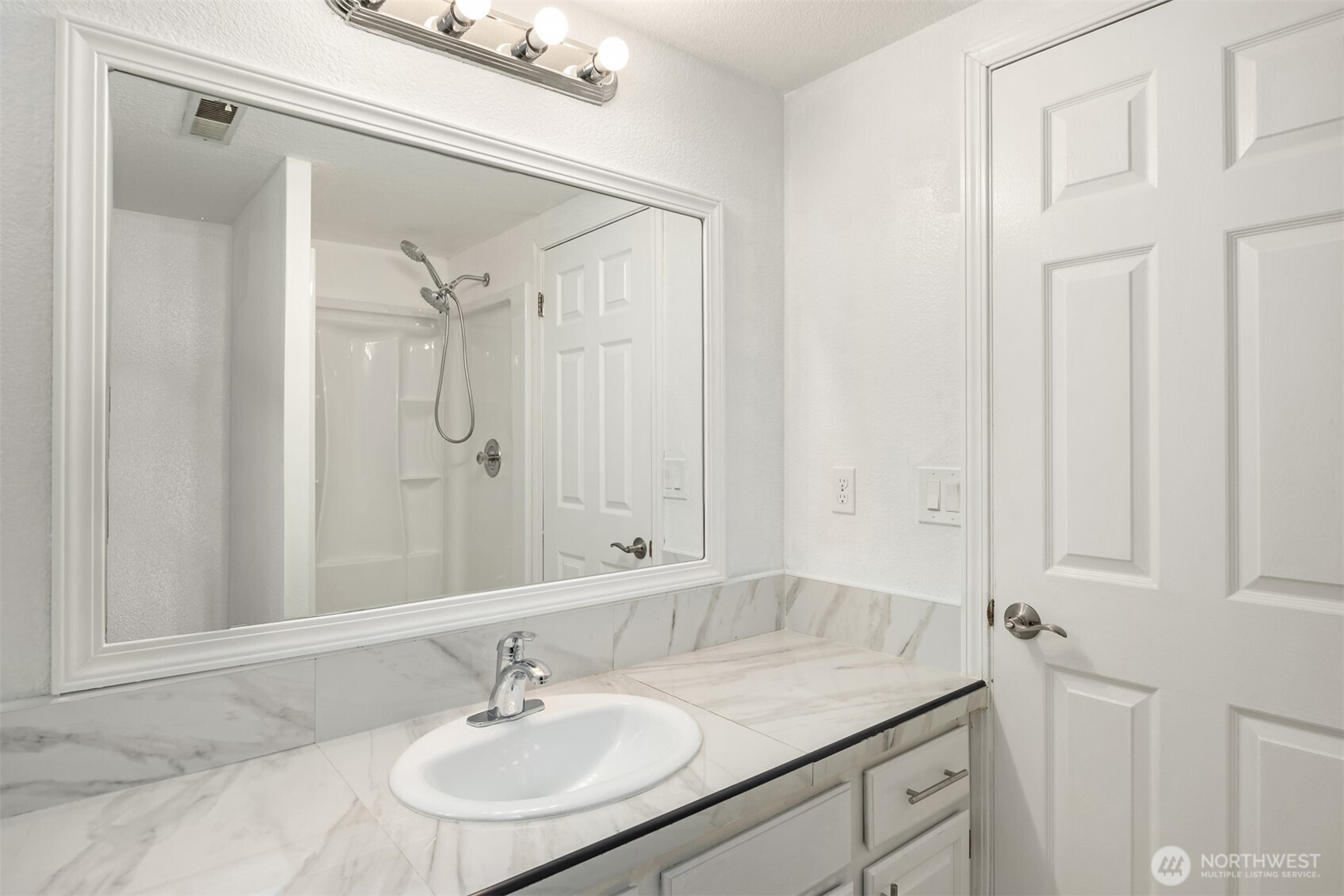 2805 Cedar Avenue South Renton, WA 98055 - Photo 33 of 40 a bathroom with a sink and a mirror