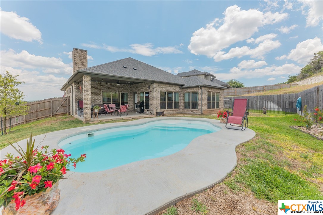 1911 High Ridge Trail Harker Heights, TX 76548 - Photo 1 of 1 a swimming pool view with outdoor seating