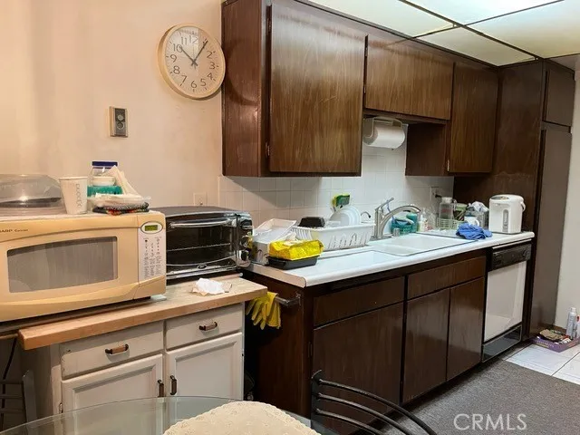 a room with furniture and a book shelf